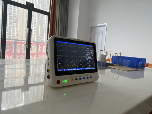 China Manufacturer's Portable 10 pulgadas Ultra delgado monitor del paciente de parámetros múltiples de la cama de examen dental de la terapia de equipo